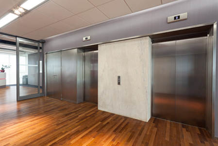 Outside view of two elevator doors.